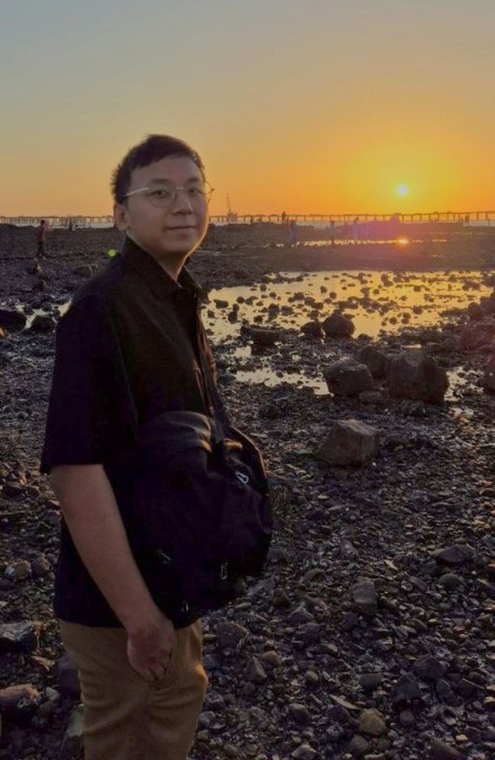 Gary Mangsatabam at the coast at sunset